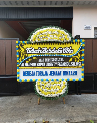 Papan Bunga Duka di Muara Sahung